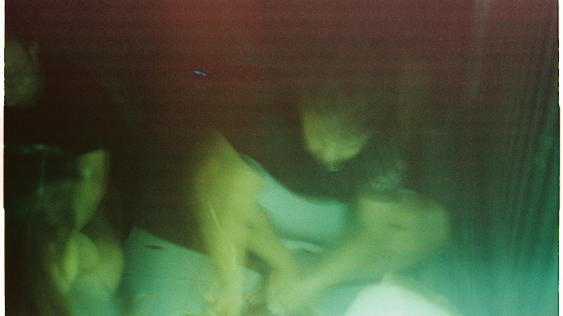 Abstract background with soft light lines suggesting focus and movement.